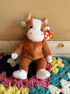 Ty Retired Bessie the Cow Beanie Baby with Original Tags and ERRORS